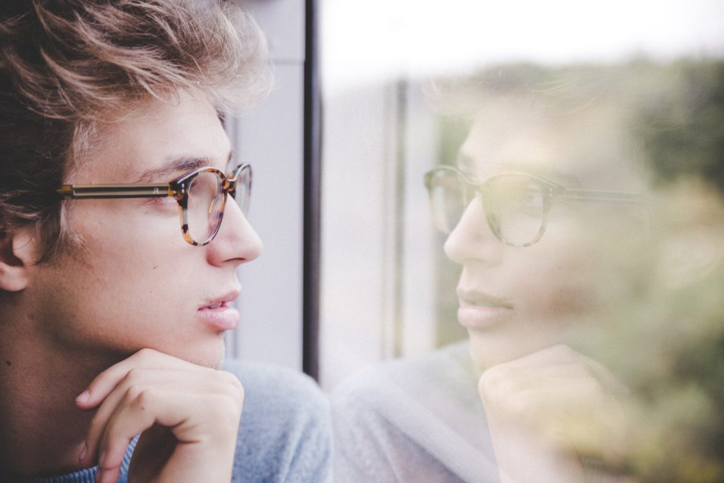 boy looking outside
